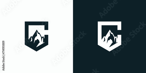 Letter C vector logo design with shield shape and mountain silhouette.