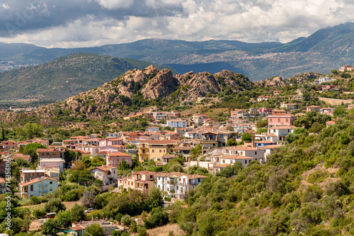 Panoramic summer view Santa Maria Navarrese, small touristic town in east Sardinia, with inner hills in the background