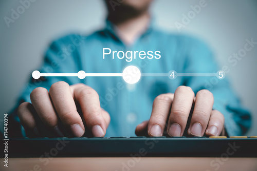 Businessman using computer keyboard to update status in checklist to remind work task progressive for project develop management and tracking concept.