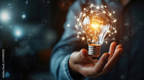 Businessman hand holding creative light bulb with industry network, analysis solution and development marketing network icons planning strategy, Modern business, Innovative of new ideas