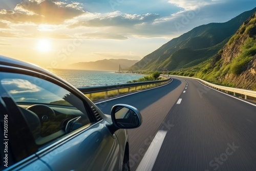 car driving on a highway. against the background of a mountain landscape, the sea and the shining sun. Travel, vacation, outdoor recreation, trip.