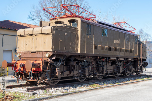 A 1934 A626 electric locomotive built for the Italian railways and displayed in the city of Foligno, Italy , at the railway repair shops . 