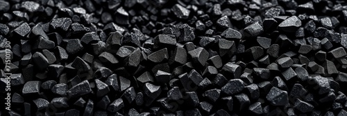 Coal Piled High, the Black Energy-Rich Mineral Used as a Fossil Fuel in Industry