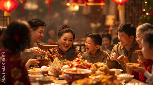 multi-generational Chinese family gathered around a large dining table filled with traditional festive dishes