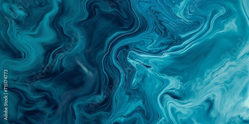 swirl of liquid paint in shades of blue and turquoise