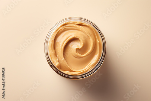 Generative AI Image of Top View of Peanut Butter in a Jar on Pink Background