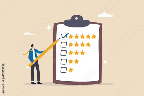 Evaluation performance survey, marketing feedback or service questionnaire, customer opinion, excellent 5 stars service, customer ranking score concept, businessman use pencil giving stars evaluation.