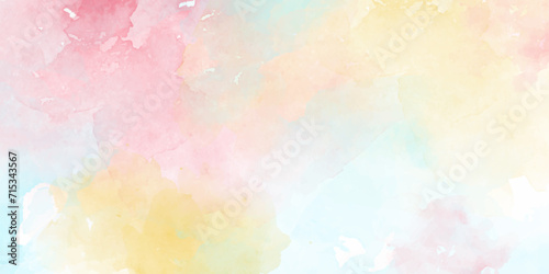 abstract pastel watercolor background. Soft colorful grunge. Colorful watercolor background with painted sunset sky colors of pink, blue purple, green and yellow. subtle watercolor grunge Bg.