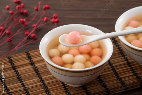 Red and white tangyuan with syrup soup.