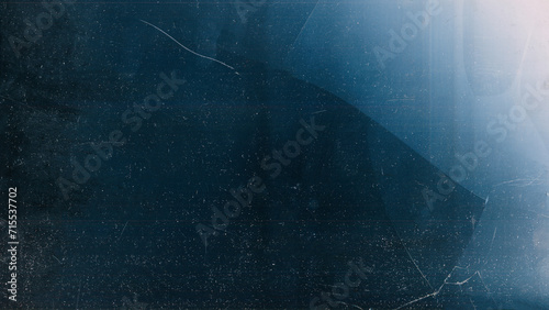 Broken screen. Distressed overlay. Blue glitch noise dust scratches damaged cracked display glass texture dark illustration abstract background.