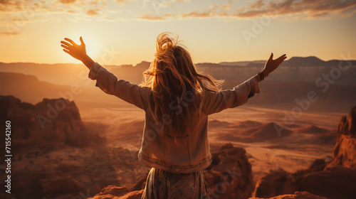 Boho woman with windy hair. Hipster girl in gypsy look, young traveler in the desert nature.