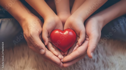 Young woman holding red heart, health insurance, donation, happy charity volunteer concept, world health day, world mental health day, world heart day