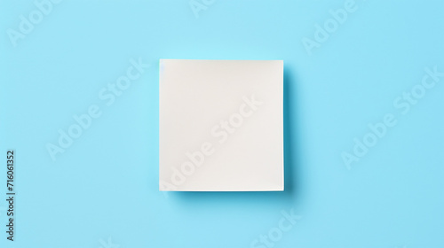 Sticky note isolated on blue background