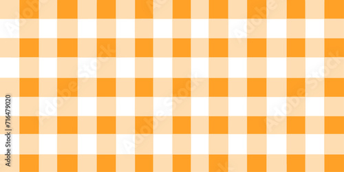 orange gingham fabric. orange and white tablecloth background pattern. square linen fabric napkin for backdrop, picnic minimalism, copy space for text, wallpaper