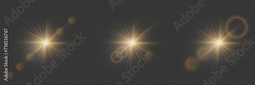 Set of shining stars and glares of light, sun particles and sparkles with effect, golden lights and sparkles. On a transparent background. Vector, EPS10