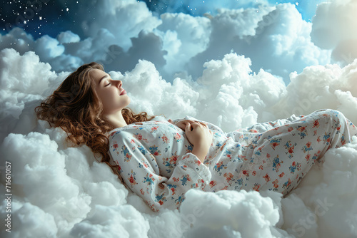 happy smiling young woman in pajamas sleeping on white clouds at night sky