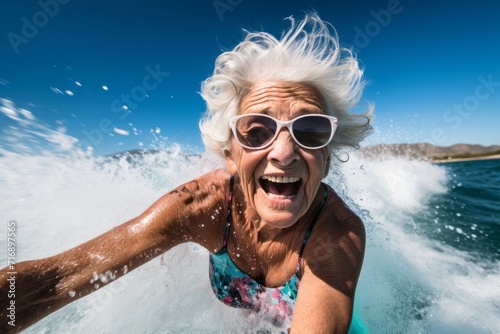 Portrait of an energetic mature woman doing water skiing in the sea. With generative AI technology