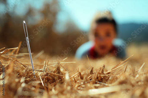 Needle in a haystack with blurred person background