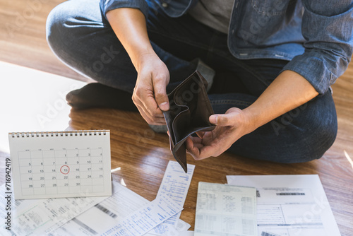 Stressed, Problem people asian woman hand holding and open an empty wallet not have money, credit card, not to payment bill, loan or expense in pay. Bankruptcy, bankrupt and debt financial concept.