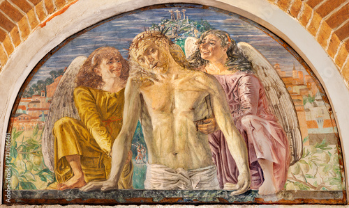 TREVISO, ITALY - NOVEMBER 4, 2023: The fresco of death Jesus among the angels in church Chiesa di San Francesco by Giovanni Barbisan (1946).