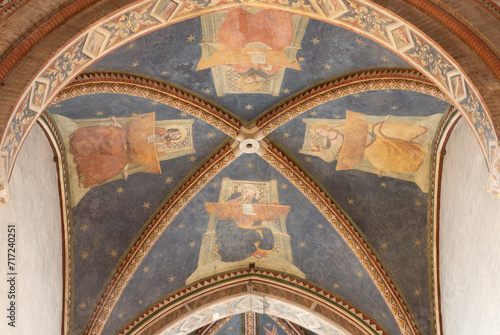 TREVISO, ITALY - NOVEMBER 4, 2023: The fresco of Four Evangelist on the ceiling of presbytery in the church Chiesa di San Francesco by disciples of Tomaso da Modena (1326-1379).