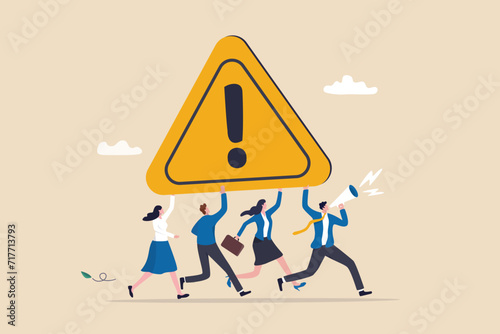 Attention message announcement, important communication or advertisement, beware warning, careful symbol or urgent notification concept, business people carrying attention sign with loud speaker.