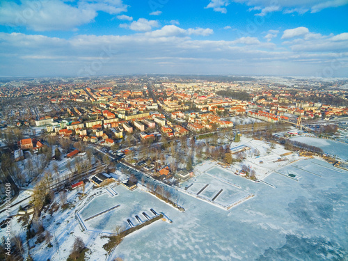 View of Gizycko town from the Niegocin lake in winter scenery, Mazury, Poland
