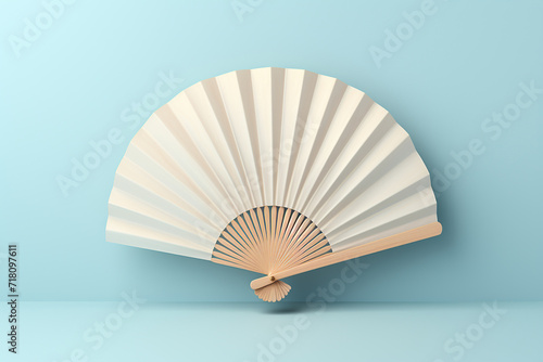 Wooden white open fan on a blue background. Generated by artificial intelligence
