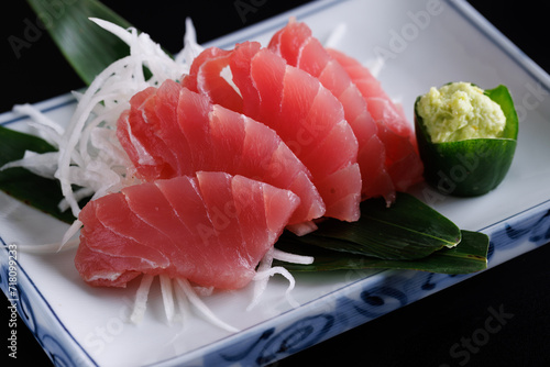 Tuna sashimi isolated in black background