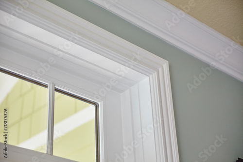 Elegant Window Frame and Crown Molding in Modern Interior