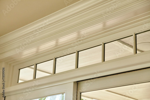 Elegant Crown Molding and Transom Windows Interior Detail