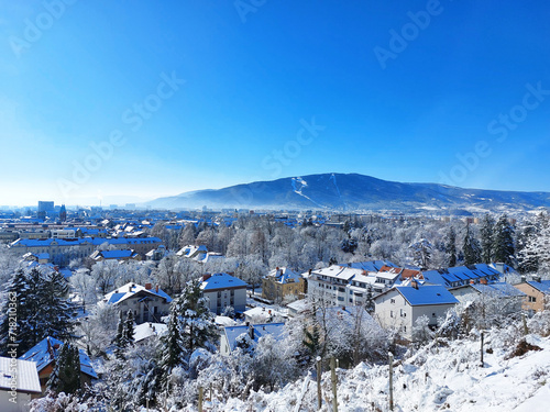 city Maribor and Pohorje mountain covered by white snow. Winter season. Slovenia