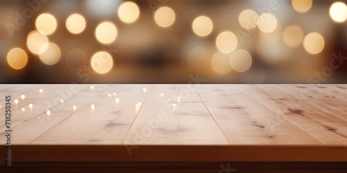 Bokeh image of kitchen counter on light wooden table.