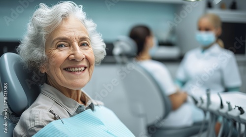happy senior woman at dentist's office looking at camera, dentist in background 