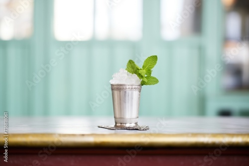 mint julep in silver cup, fresh mint