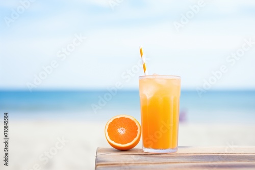 orange soda can with beach background