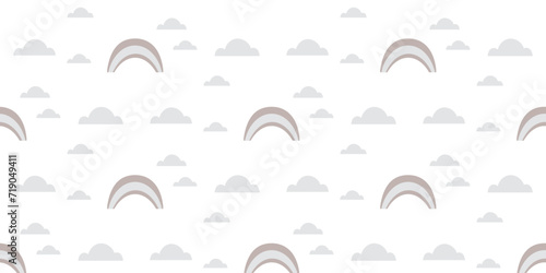 Seamless children's vector pattern in pastel colors for printing on fabric and paper. Stylized rainbow in the clouds.