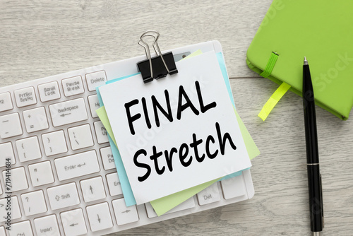 Final Stretch text on note paper on white keyboard