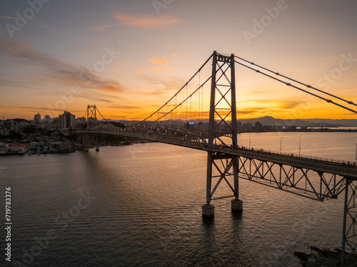 beautiful sunset on the Hercílio Luz bridge, in Florianópolis, Santa Catarina. Overlooking the mainland of the city