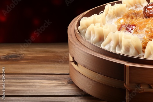 Assorted traditional chinese dim sum and famous national dishes on rustic wooden table