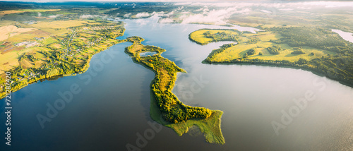 Lyepyel District, Lepel Lake, Beloozerny District, Vitebsk Region. Aerial View Of Residential Area With Houses In Countryside. Top View Of Island From High Attitude In Autumn Morning. Bird's Eye View