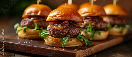 Delicious Homemade Mini Beef Burgers Served on a Charming Miniature Board: Homemade, Mini, and Beef Burgers Perfectly Presented on a Serving Board