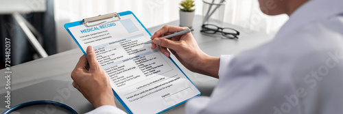 Doctor carefully review detailed medical report and diagnosing illness for effective healthcare treatment plan for patient in doctor office. Professional medical evaluation. Neoteric