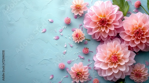Colorful autumn dahlia flowers on pastel table with copy space for your text top view and flat style. Banner format. 
