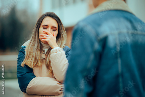 Sad Woman Fighting with her Husband Outdoors in the Park. Woman suffering after a break-up quarrel with her boyfriend 