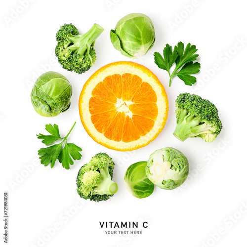Broccoli, brussel sprouts, parsley and orange isolated on white background.