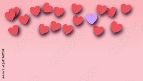 corazones sobre un papel color rosa sobre el dia del amor y la amistad