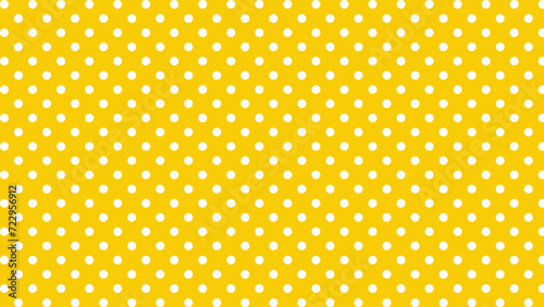 Yellow and white polka dots background