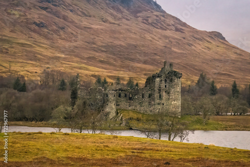 Kilchurn castle with loch and mountains 