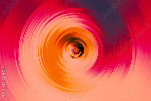 Koncentryczne okręgi z gradientem z dominacją koloru czerwonego, rozmycie ruchu - abstrakcyjne tło, tapeta